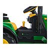 Lastetraktor John Deere aku ja haagisega